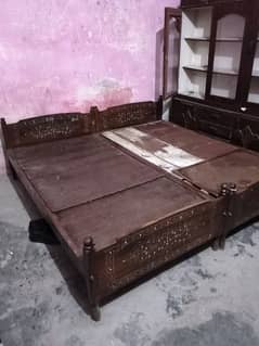 selling 04 single beds 01 wooden sofa,,01 Burton showcase, 01 dressing
