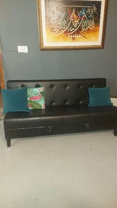 Unifoam Black leatherite sofa cum bed with storage