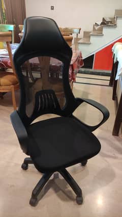 Revolving office chair almost new