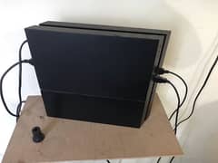 PS 4 with extra controller  and 2 games