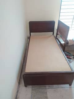 2 single beds with almost new mattress