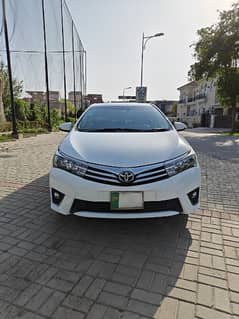 Toyota Altis Grande 2015 in superb condition with sunroof