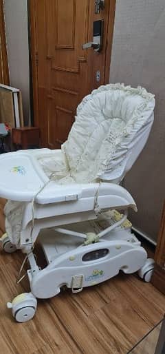 high chair, rocking bed