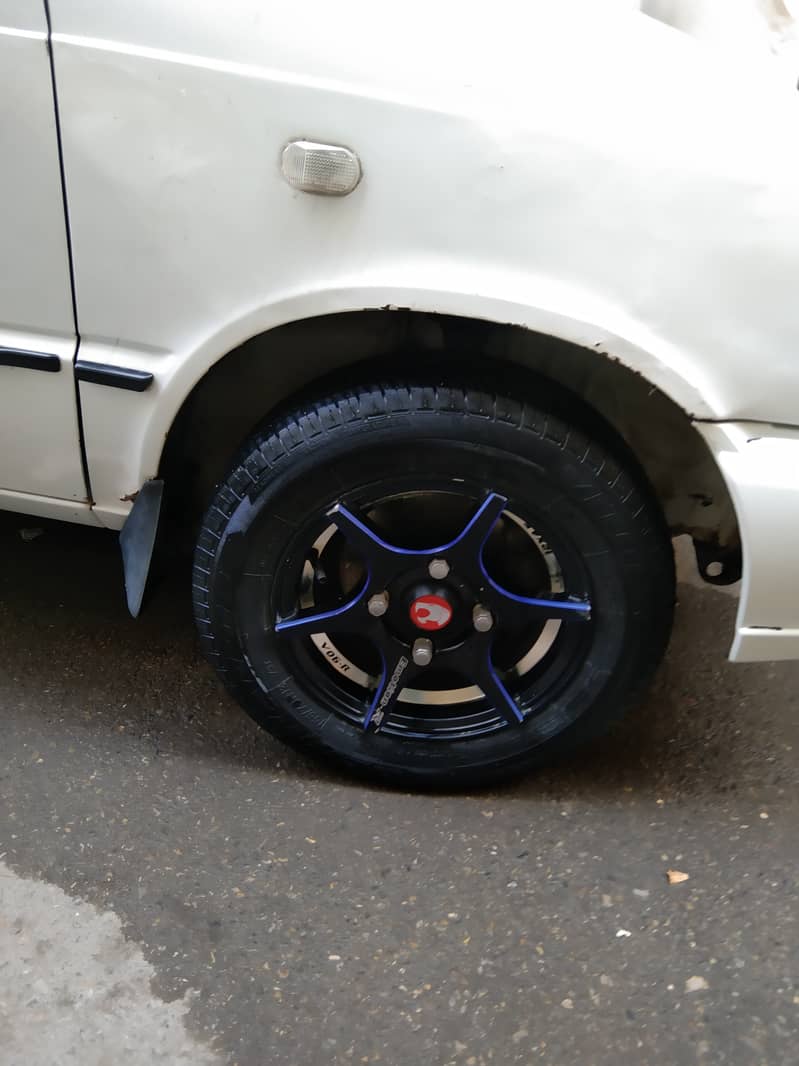 Suzuki Mehran Vxr b to b original alloys wheels woofers system install 4