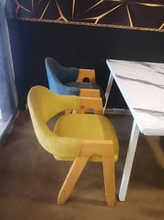 chairs and table made by imported wood