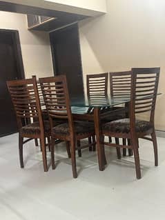 Glass dining table with 6 chairs