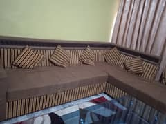 brown l shaped sofa