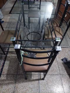 6 chair dinning with glass table good condition