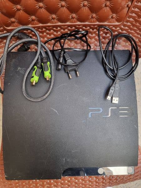 PS3 slim jailbreak 320 GB with 2 controllers and wires 0