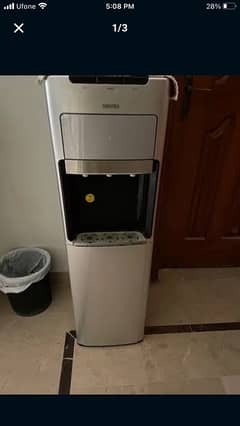 Toshiba water dispenser with bottle in bottom