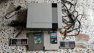 Nintendo NES original console along with 2 cartridge