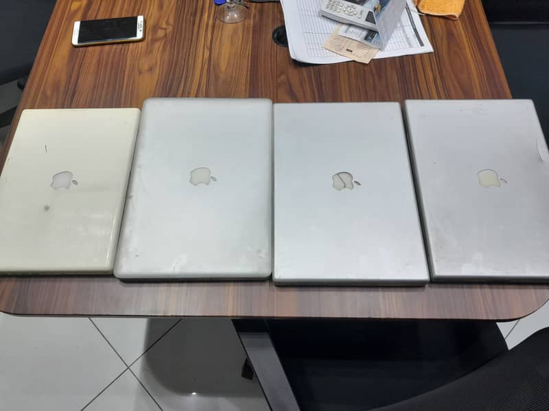 Four Apple Laptops in Asis Condition,Pictures Attached, Fixed Price 1
