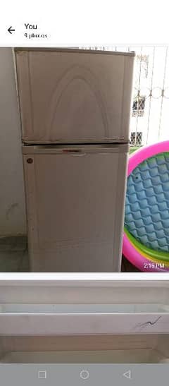 A medium size Dawalance refrigerator in good working ondition