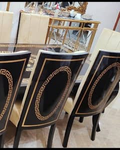daining table + 8 chairs + 12mm glass 4month used