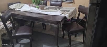 Wooden dinning table with 5 chairs