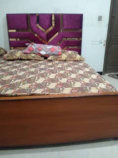 Double bed queen size with one side table only