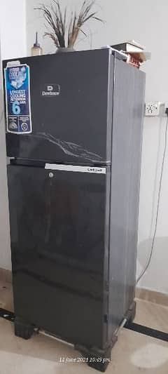 dawlance refrigerator, very good condtition, medium size, black colour