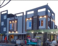 A New Purpose Built Corner Building At Main Chiniot Road At The Top Location Of Civic Avenue Commercial Market.