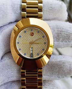 rado golden watch