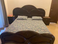 King size bed with 2 side tables, dressing table, and spring mattress
