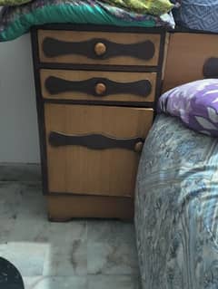 Double bed with two side tables