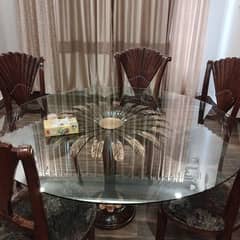 Glass top Dining table with 6 chairs are available in good conditions