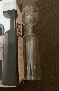 Glass Bottle with free metal heart stopper bottle