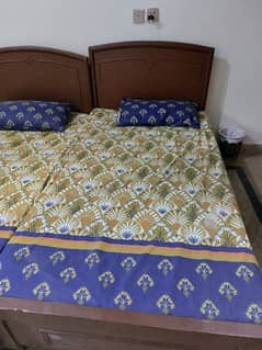 2 single beds with 2 single mattress
