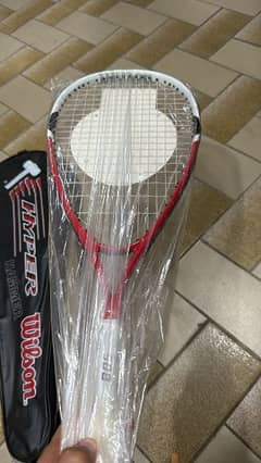 wilson squash racket (with net & grip)