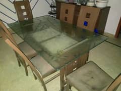 Glass topped dinning table