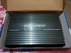 Amplifier four channel brand new with box only one month used. .