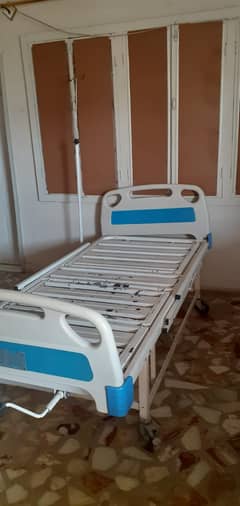 Hospital patient bed and examination couches