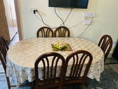 Dining table with six chairs.