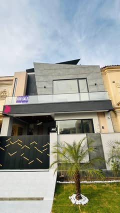 "Luxury Modern 5 marla House for Sale Near Raya, DHA Prime Location, Exquisite Craftsmanship, and High Investment Potential"