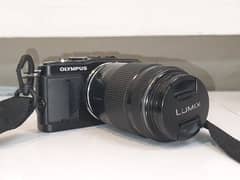 Olympus E-PL5 & Lumix OIS 45-175 mm lens (Read ad first)