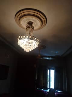 2 Chandeliers with their own wall lights set of 2.