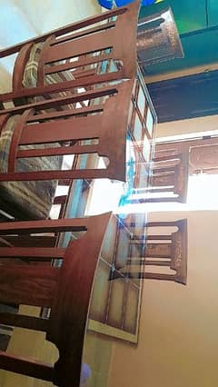 wooden glass table, 6 wooden chairs