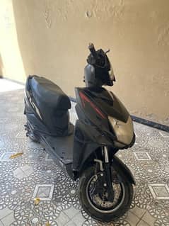 other scooty in black colour full lemination