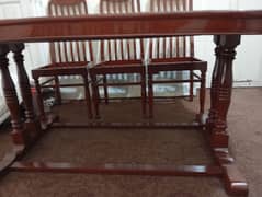 wooden dining table with 6 chairs