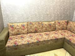L Shaped sofa with cushions