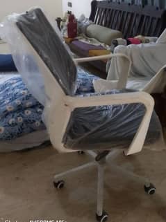 Full back ergonomic revolving chair