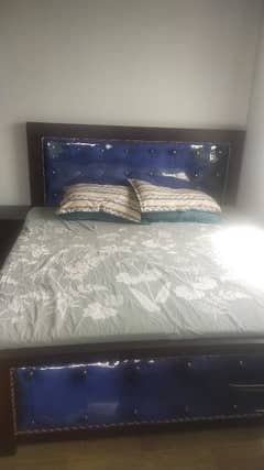 Double  Bed with metrics and 2 side table