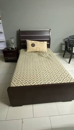 Single bed with mattress and side table- brown wood in good condition