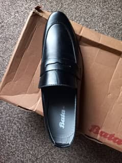 Brand new black colour shoes from Bata company with original box. Made