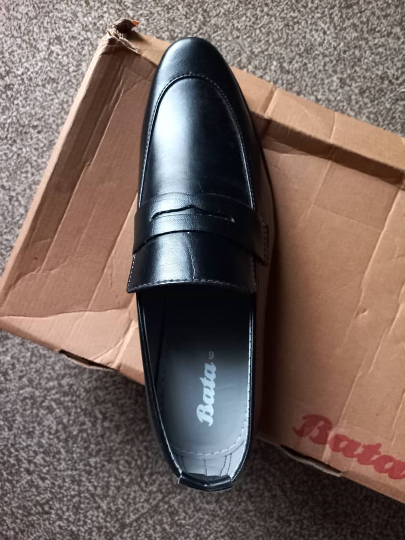 Brand new black colour shoes from Bata company with original box. Made 0