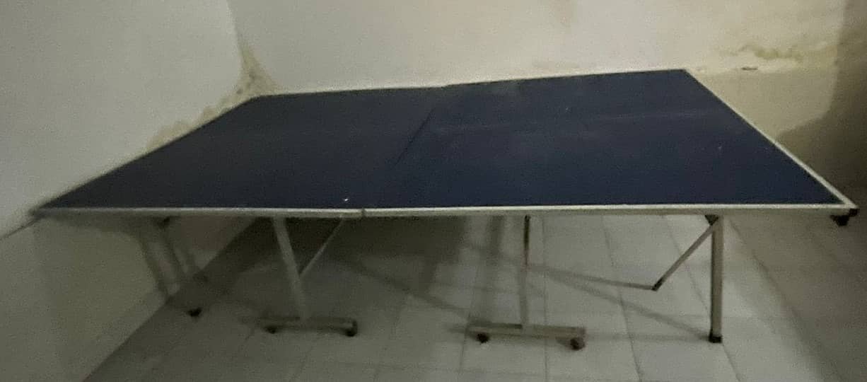 Tennis Table & Net. Foldeable With 8 Wheels. Average Condition. 0