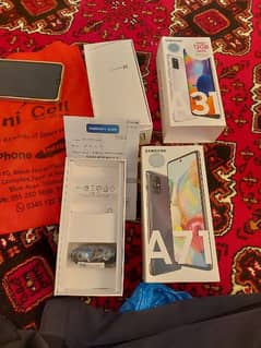New mobile complete box samsung A71. +samsung A31