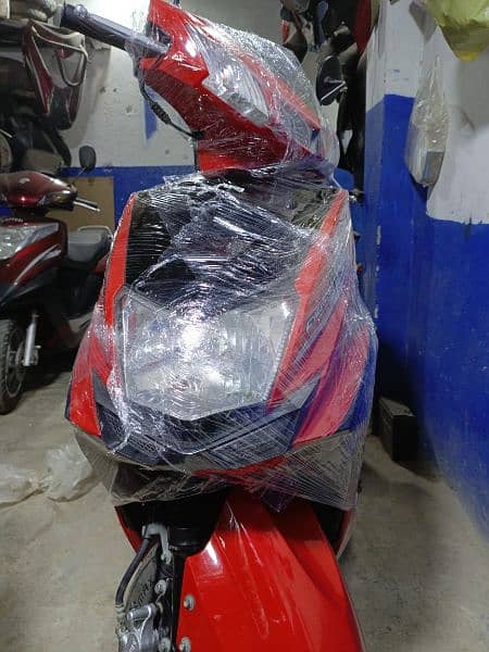 united scooter 100cc available contact at mobile 03004242432# 19