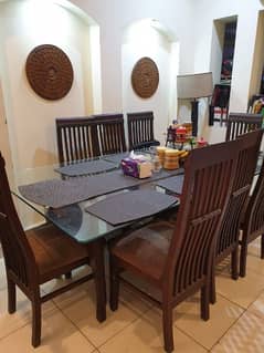 8 seater Dining table in good condition. . . Durable glass. . .