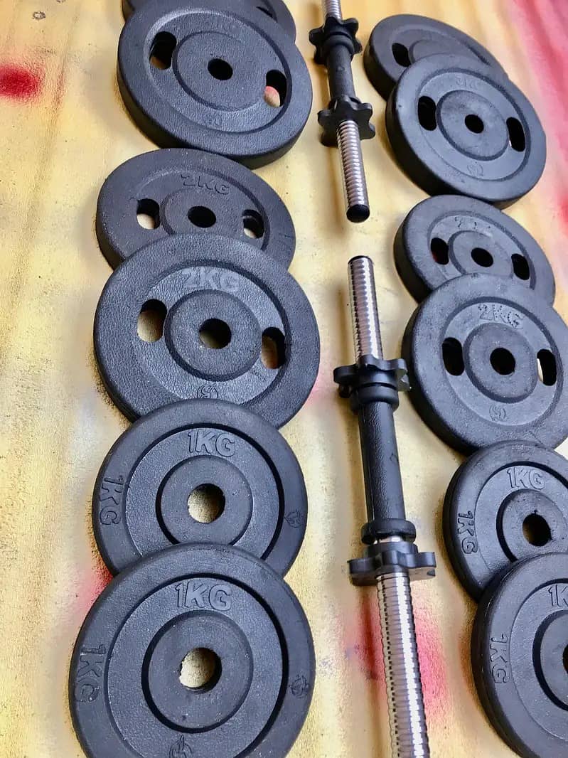 Home gym setup / dumbbell rods / plates / rubber coated plates 2